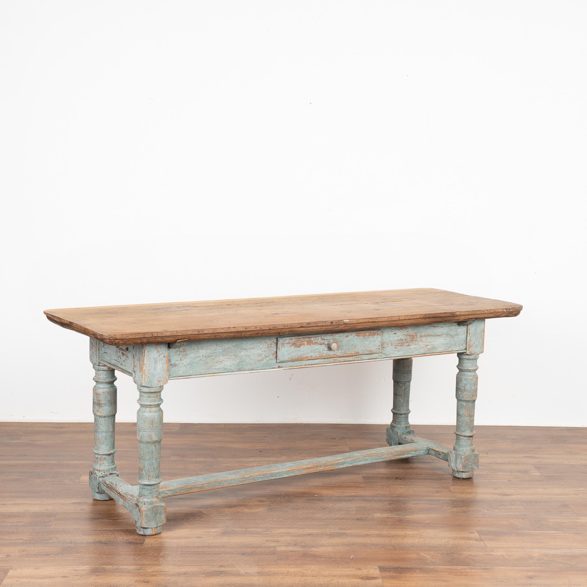 This Danish oak baroque table with heavy turned legs has strong appeal with the aged top revealing the depth of generations of use, seen in every crack, gouge and scrape.
The base with single drawer has been given a newer professionally applied