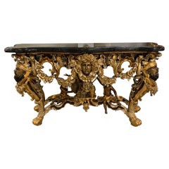 Tavolo da console barocco con figure in bronzo intagliato e piano in marmo Made in Italy