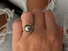 Anello vintage con perle di Tahiti e diamanti a raggiera in oro giallo 18 carati