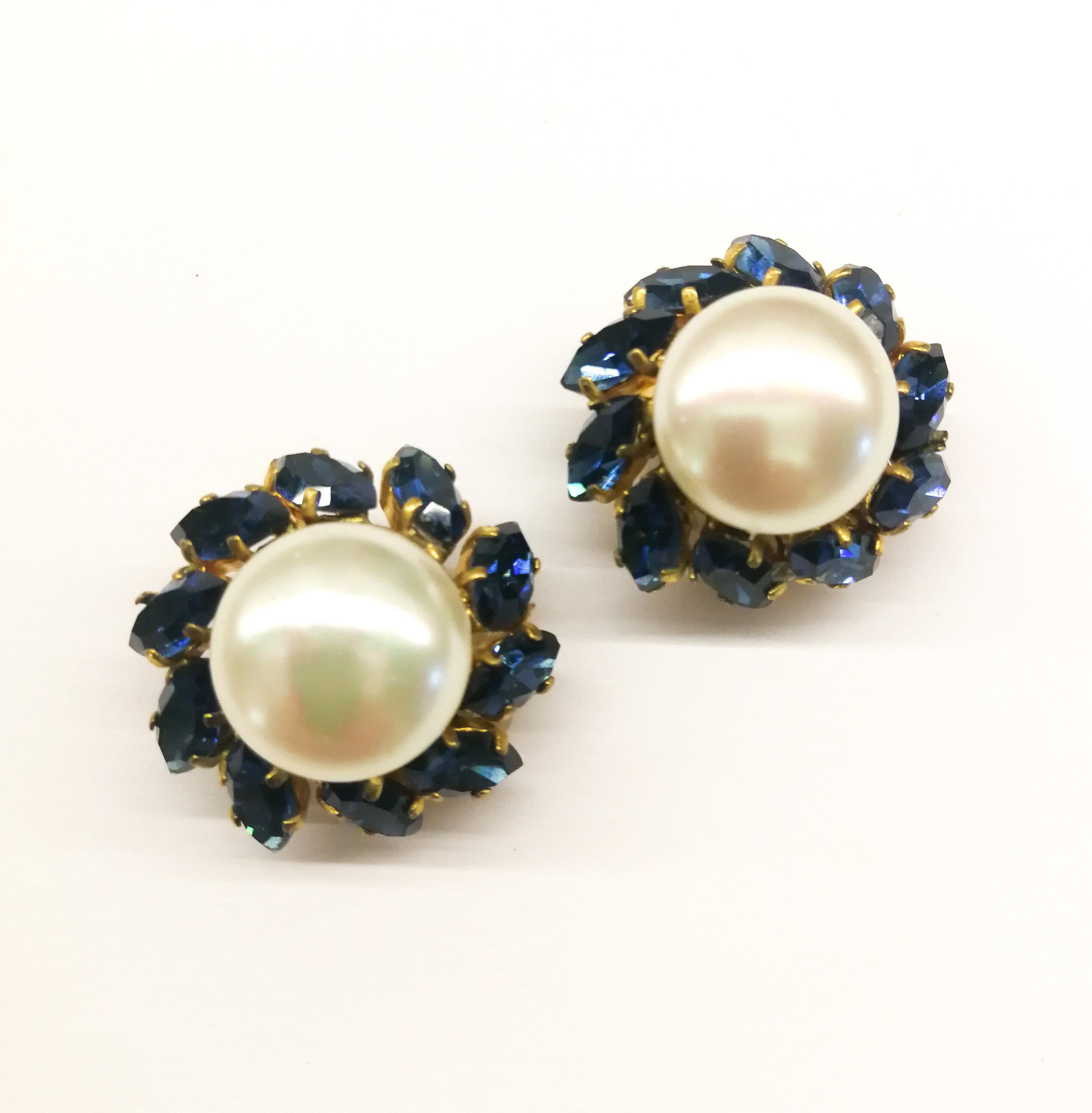 A very smart and classic design from Chanel, these earrings are very wearable. Set with beautiful deep blue pastes, surrounding a large central baroque pearl, they are an early design, made, by hand, by Maison Goossens, for Chanel, in the late