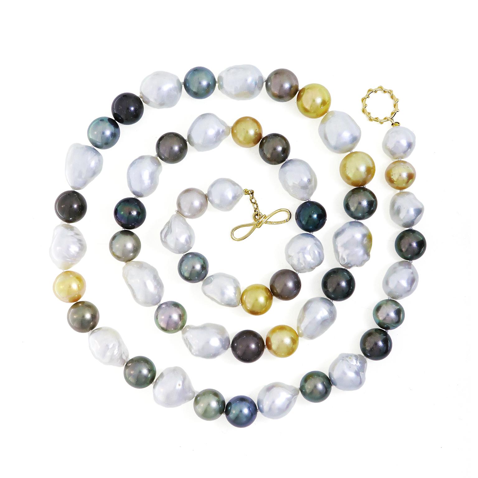 This necklace contains serene earth colored pearls. Between the Baroque south sea pearls are accents of Tahitian pearls, which include yellow, brown and gray tones. An 18k yellow gold knot and toggle clasp fastens the necklace.