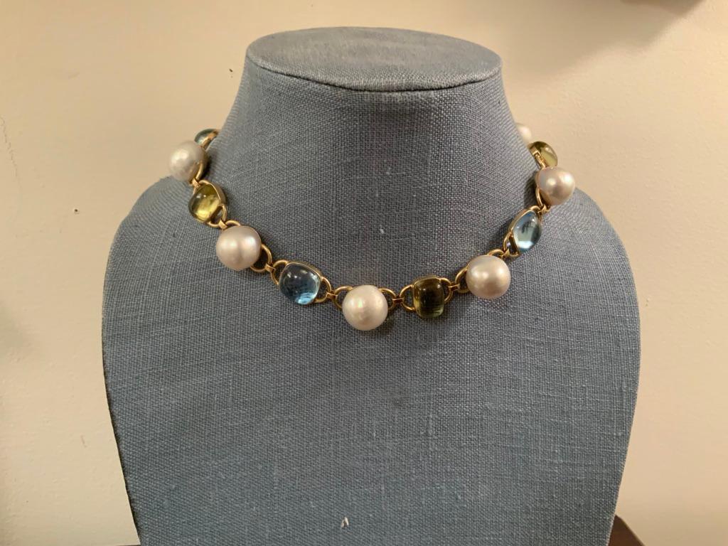 Elegant 18kt Yellow gold Necklace with 9 Baroque South Sea cultured pearls and 4 Lemon Citrine cabochons stations and 4 Blue Topaz cabochons stations.  

The Blue Topaz cabochon measure approximately 14mm and the Peridot measure approximately