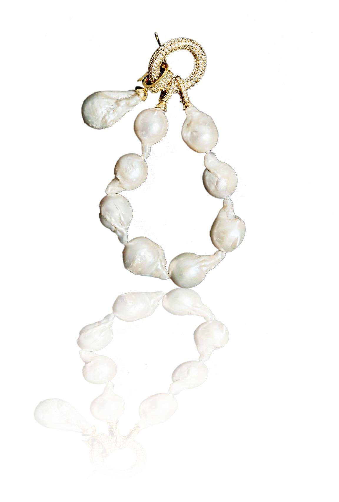 Pearl bracelet with genuine baroque pearls with an adorned lock shining with crystals and a removable oversized genuine baroque pearl charm.