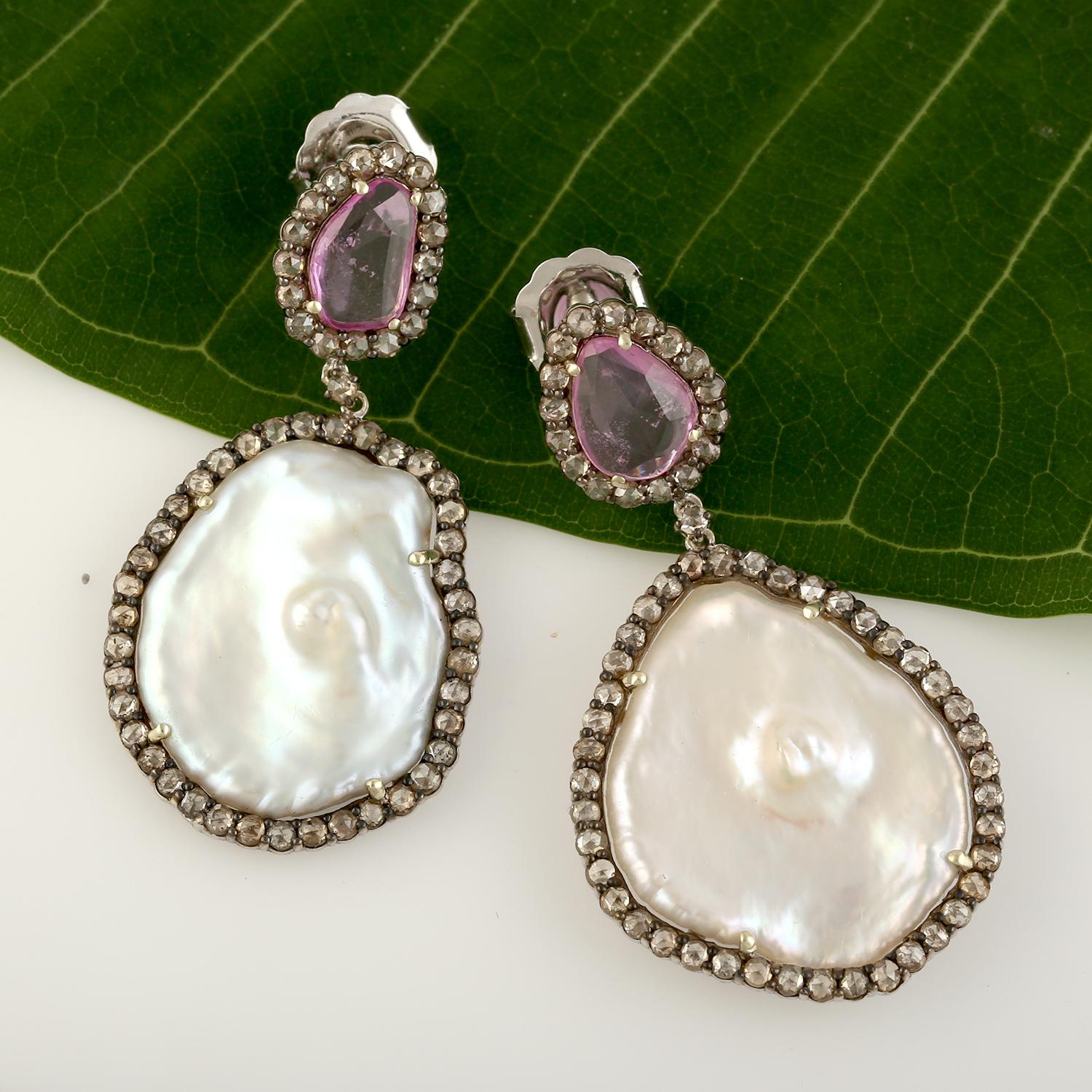 14KT:7.634g,
Diamond:3.67ct, 
Pearl:32.21ct,
Sapphire:2.91ct,