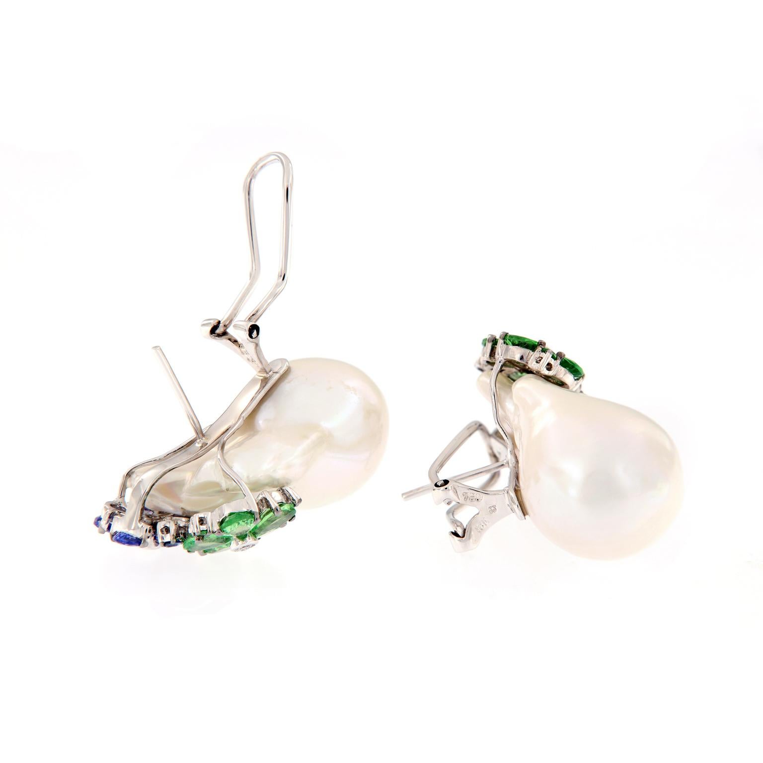 Stunning large fresh water baroque pearl earrings accented with colored gemstones flowers set in 18k white gold. Weigh 27.3 grams.

Diamonds 0.10 cttw
Colored Gems 4.67 cttw