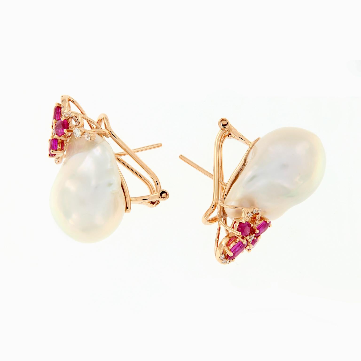 Lovely fresh water baroque pearl earrings feature a contemporary floral design of rubies and diamonds set in 18k rose gold. Weigh 18.9 grams.

Diamonds 0.29 cttw
Rubies 1.82 cttw 