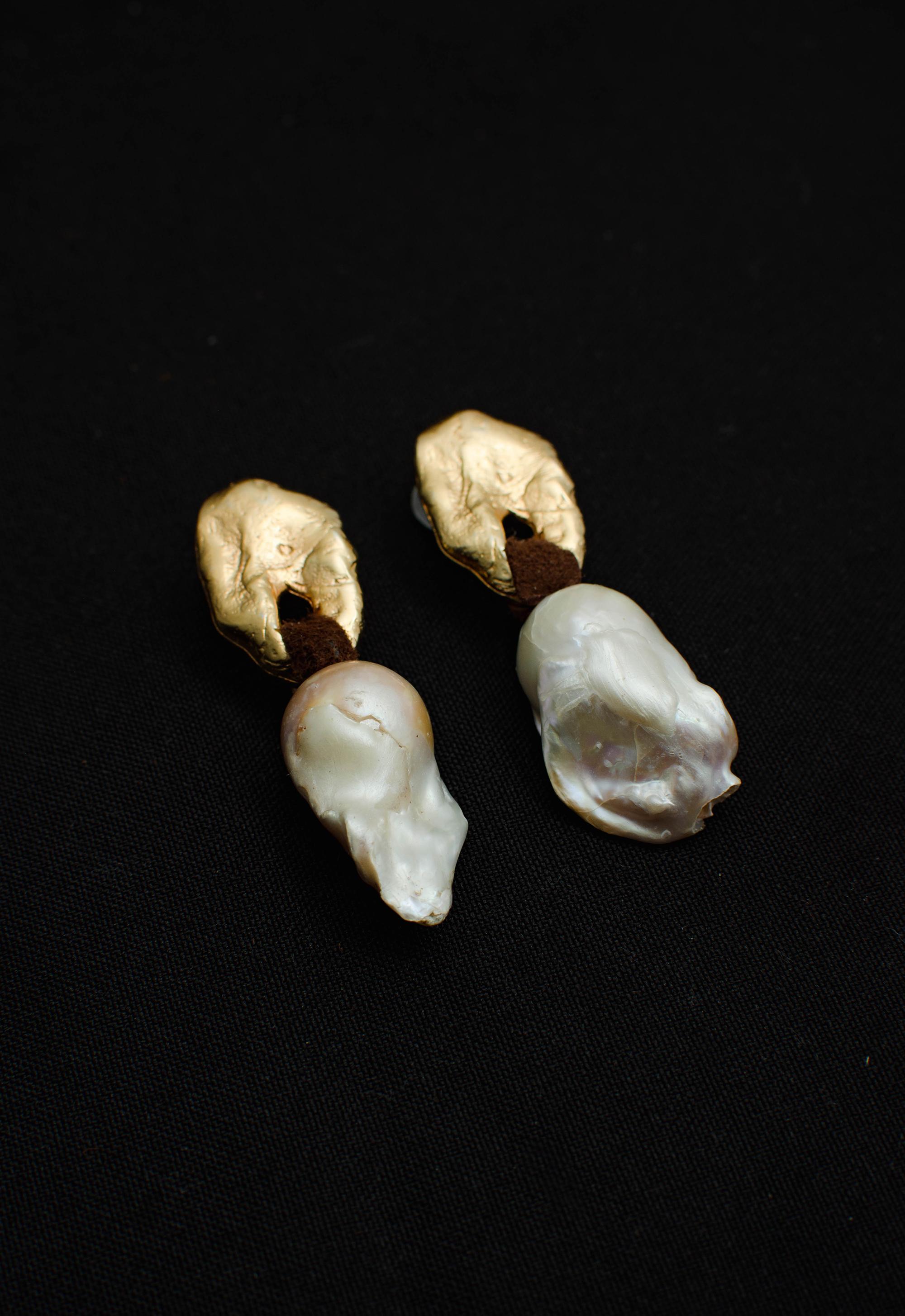 Modernist Baroque pearl earring with leather For Sale