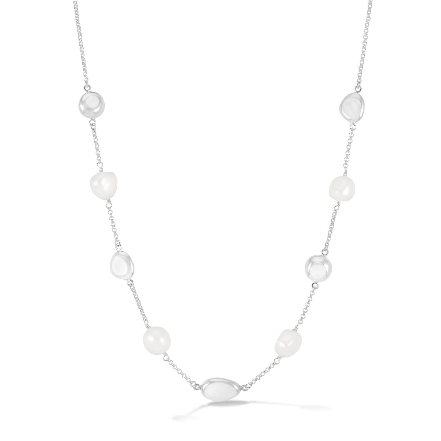 Handcrafted in sterling silver, this chain necklace is adorned with five organically-shaped pebble pods and four lustrous white baroque freshwater pearls. Baroque pearls are naturally irregular in shape and known for their one-of-a-kind nature. The