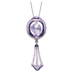 6.93 Carat Pearl Vivid Blue Sapphire and Diamond Pendant/Brooch