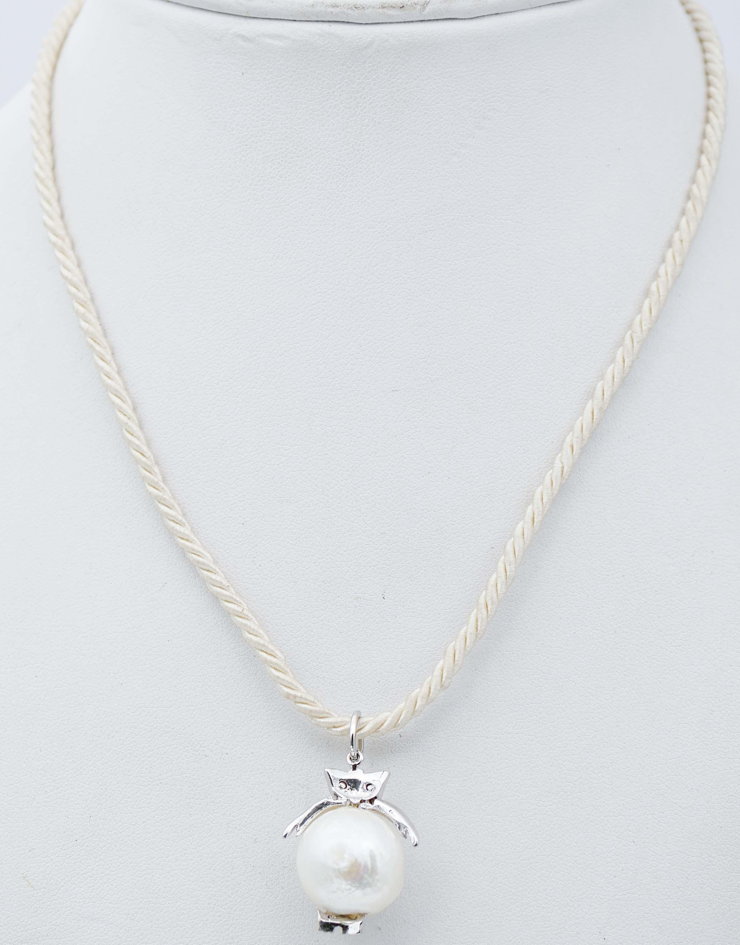 Mixed Cut Baroque Pearl, Black Diamonds, 14 Karat White Gold Owl Pendant Necklace. For Sale