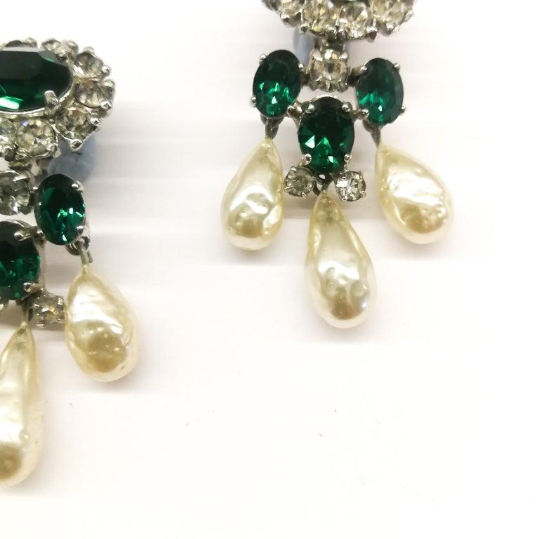 Simple and classic clear and emerald paste and pearl drop earrings, made by Michel Maer for Christian Dior in the early 1950s.  A small token of vintage Christian Dior heritage.     
Earrings such as these are great to highlight a more casual look,