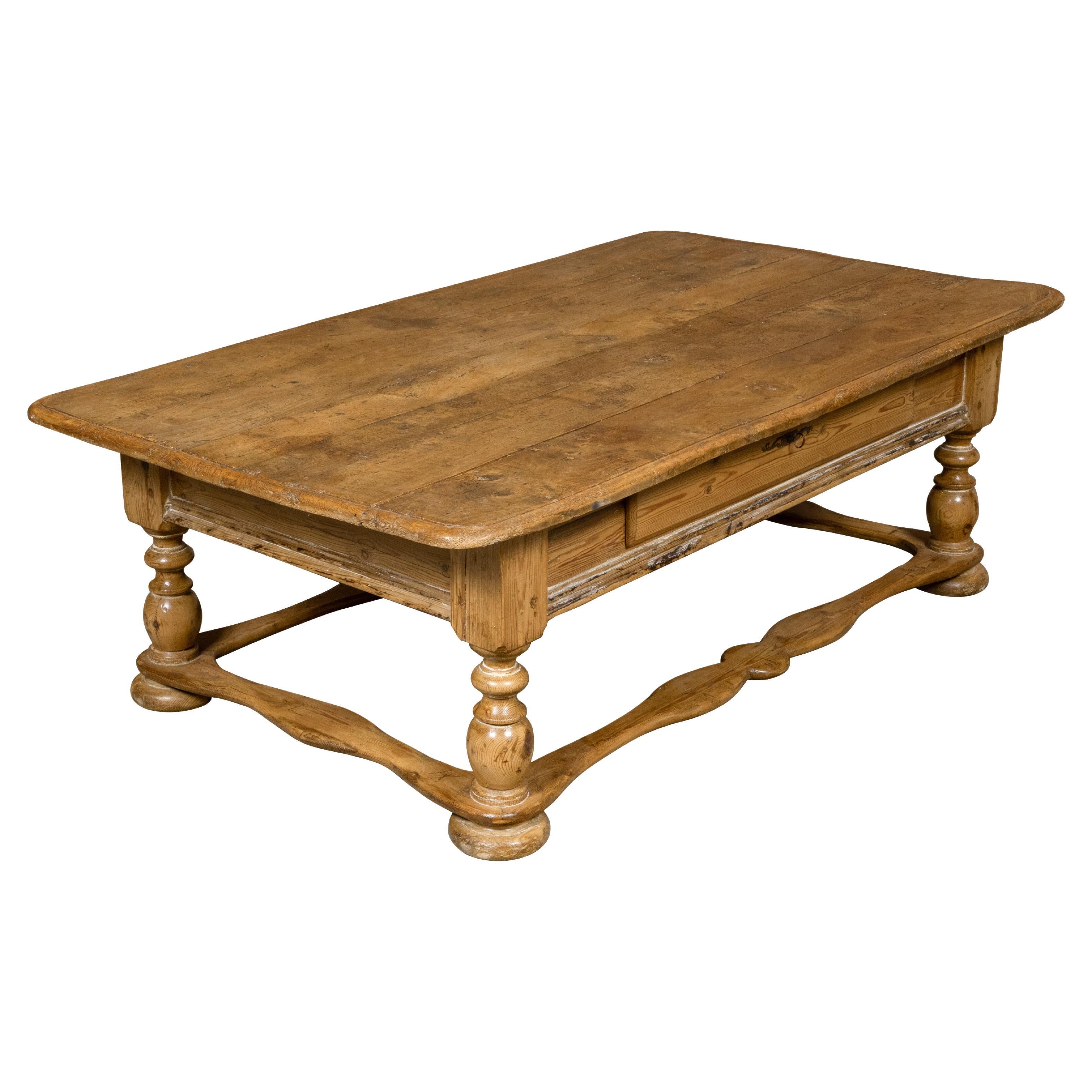 Baroque Pine Coffee Table with Turned Legs, Single Drawer and Carved Stretchers For Sale