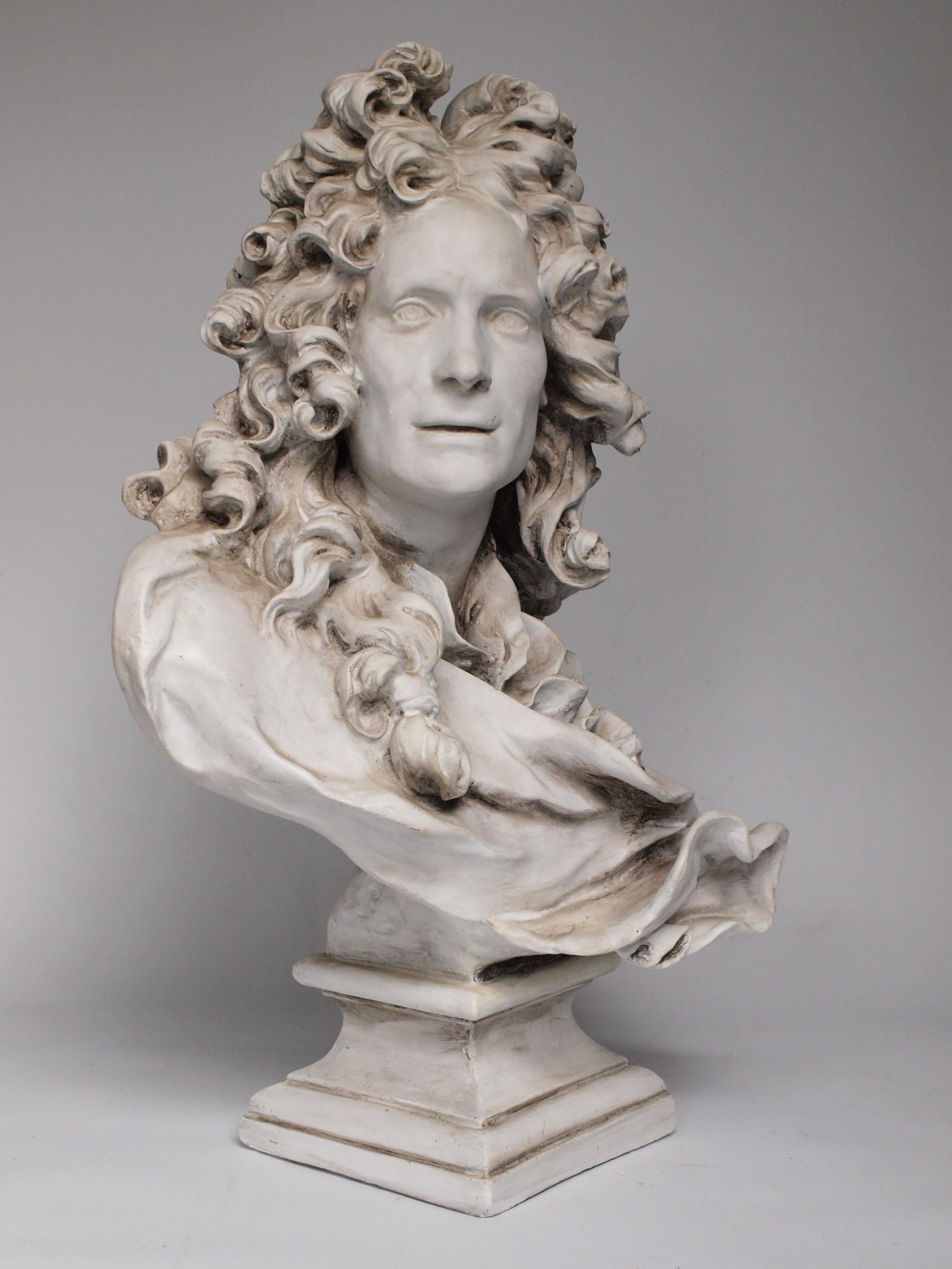 A plaster bust of a gentleman with flowing locks in the 17th century French Baroque manner of Bernini.
 