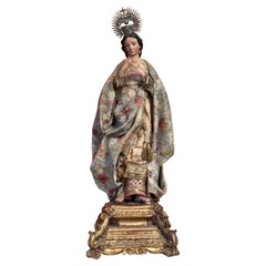 Vergine barocca in legno policromo con corona d'argento d'epoca, XVIII secolo