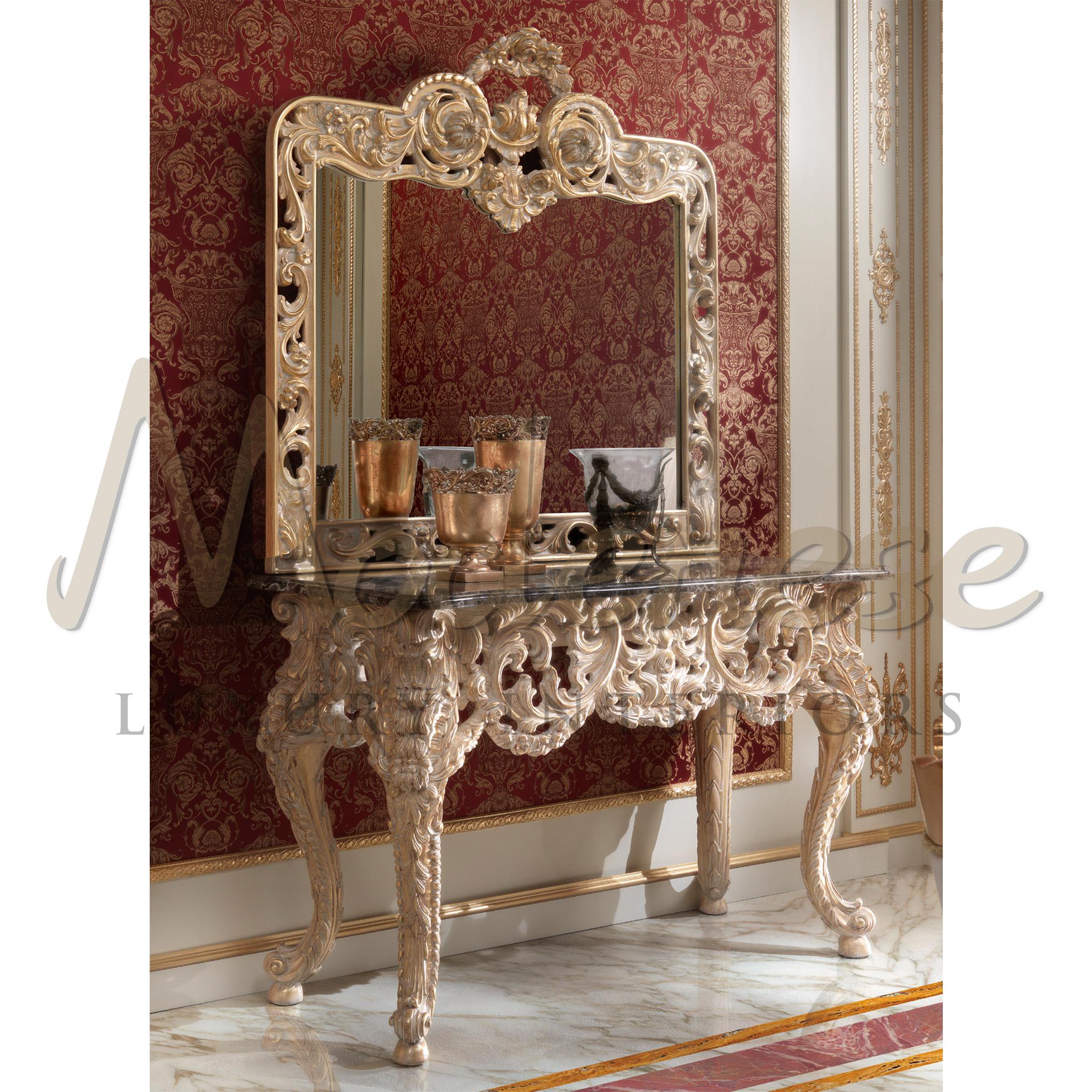 This wonderfully designed console is part of Modenese Luxury Interiors' masterpieces collection. The baroque shape of the full structure highlights the focus of our artisans on hand-carving woodworking, which has been carried on from father to son.
