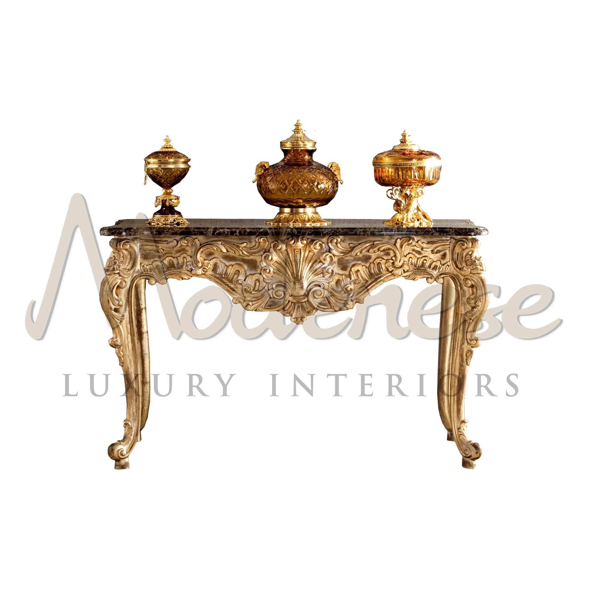 This baroque-style console is one of Modenese Luxury Interiors' masterpieces.
The baroque shape of the whole structure highlights our artisans' focus on hand-carving woodworking, which has been carried on from father to son. At second sight, one