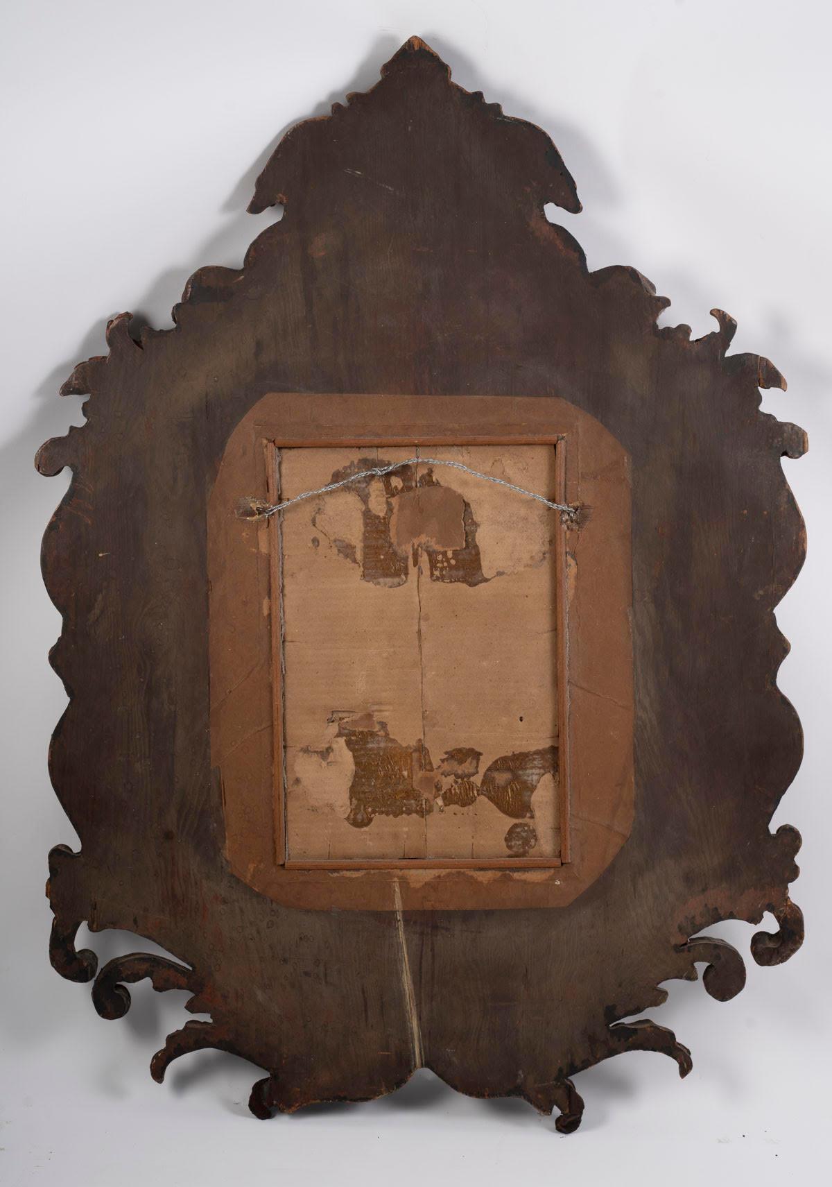 XIXe siècle Miroir mural de style Régence baroque en bois sculpté et patiné, 19e siècle. en vente