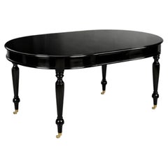 Baroque Revival Black Lacquer Extending Dining Table with Brass Castors