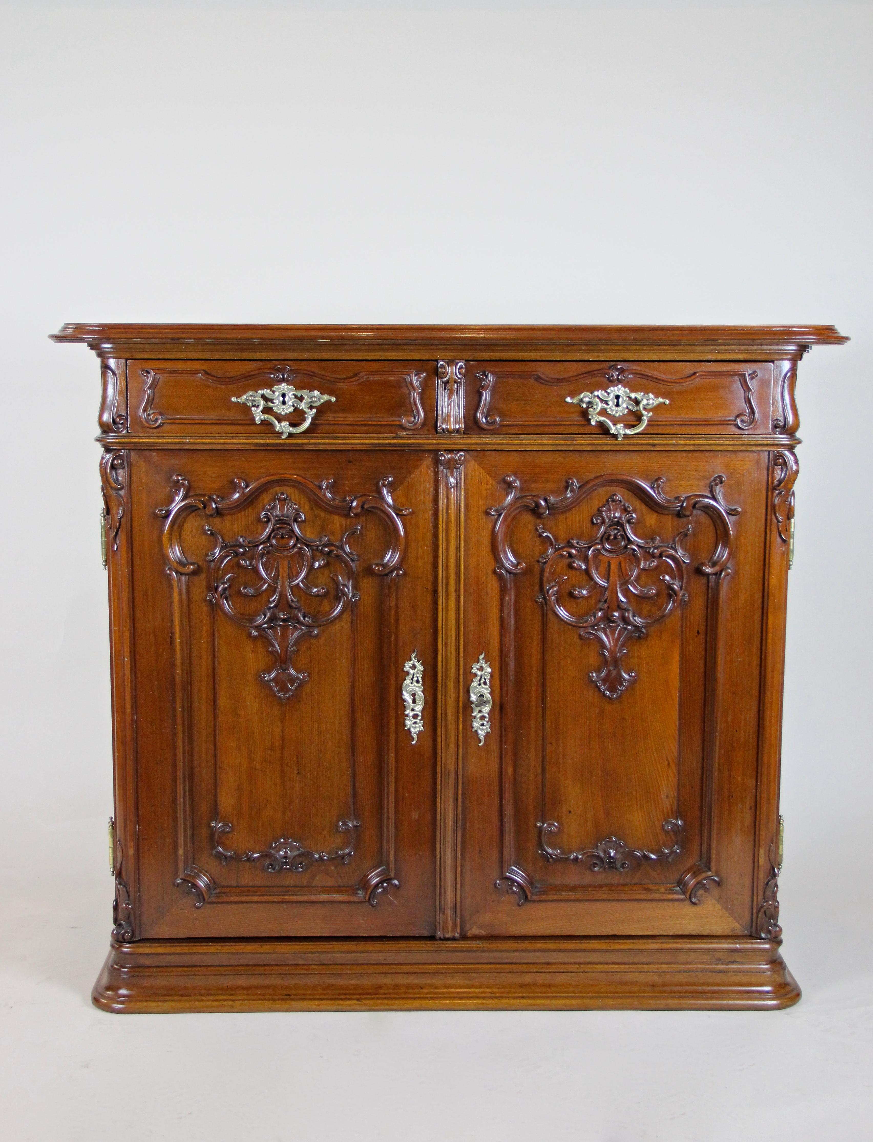 Remarkable Baroque revival commode or Trumeau with fantastic nut wood carvings out of Vienna/ Austria from the end of the 19th century. After an elaborate restoration process it now shows its full beauty again. Made circa 1880, the so-called