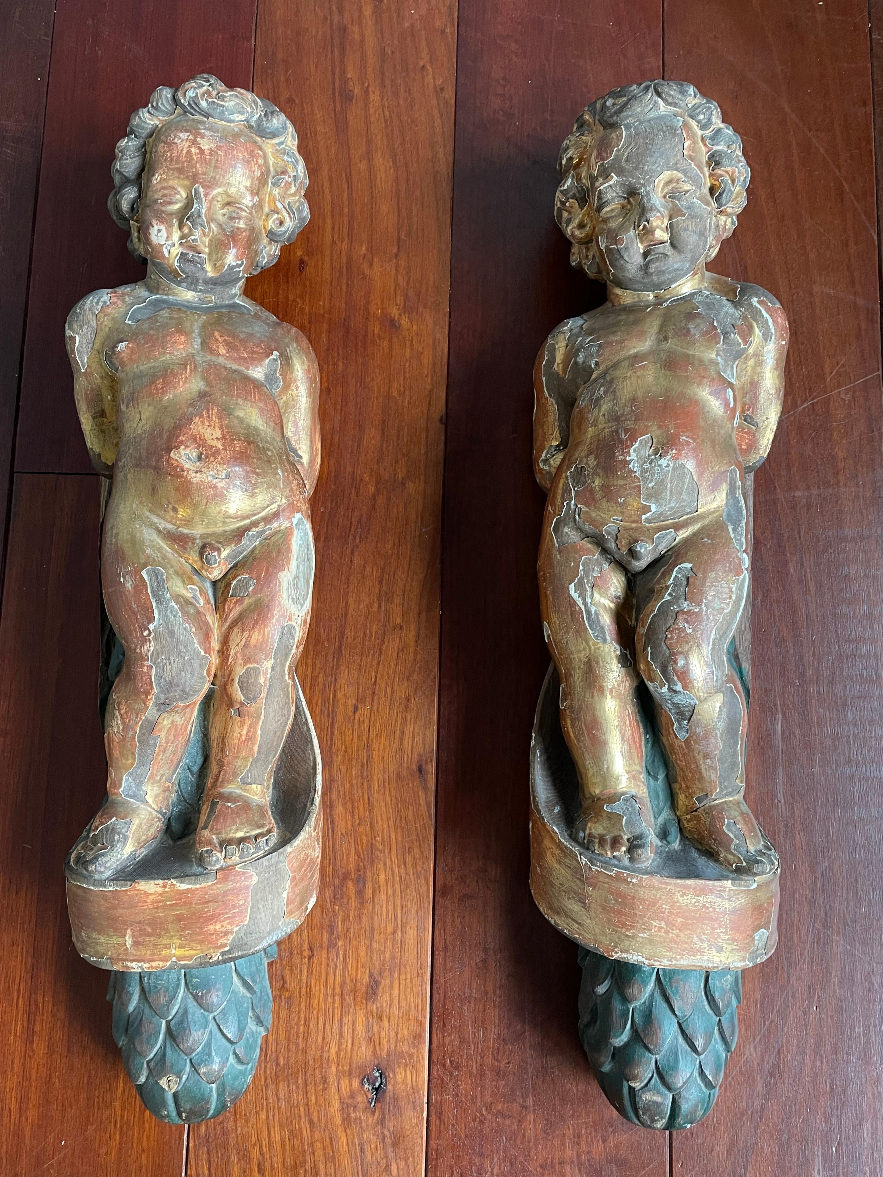 Beautifully aged, Baroque Revival putti sculptures for wall mounting.

If you are looking for decorative and handmade antique wall-art to grace your living space then these hand carved and gilt wooden antique putti sculptures could be perfect. You