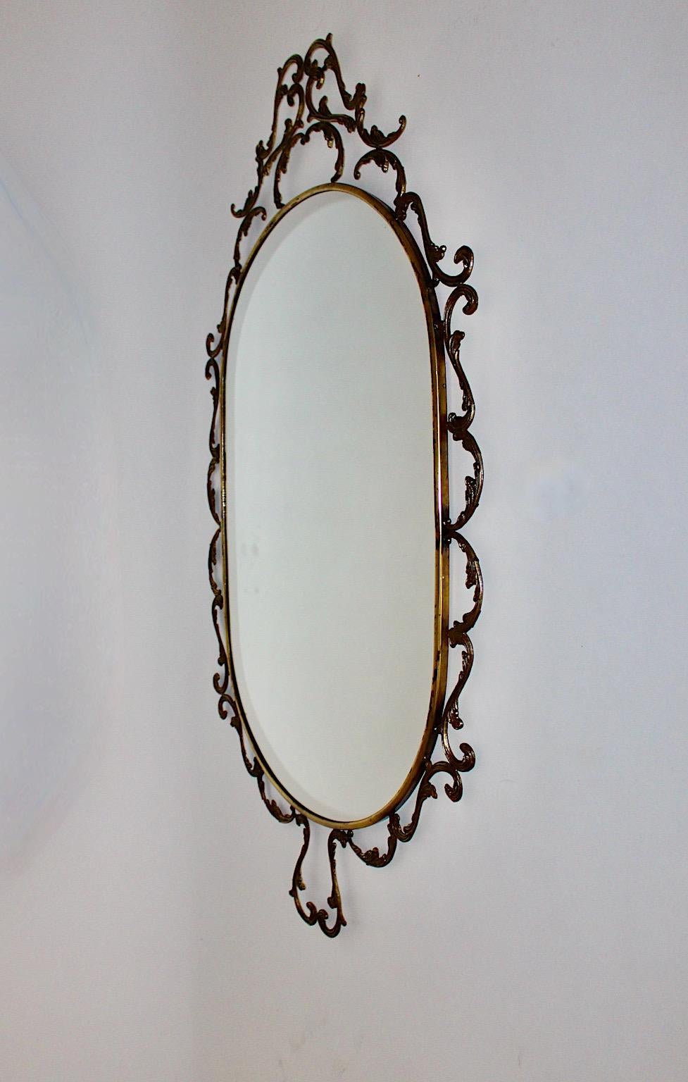Mid-20th Century Baroque Revival Style Vintage Oval Wall Mirror Brass 1960s Italy For Sale