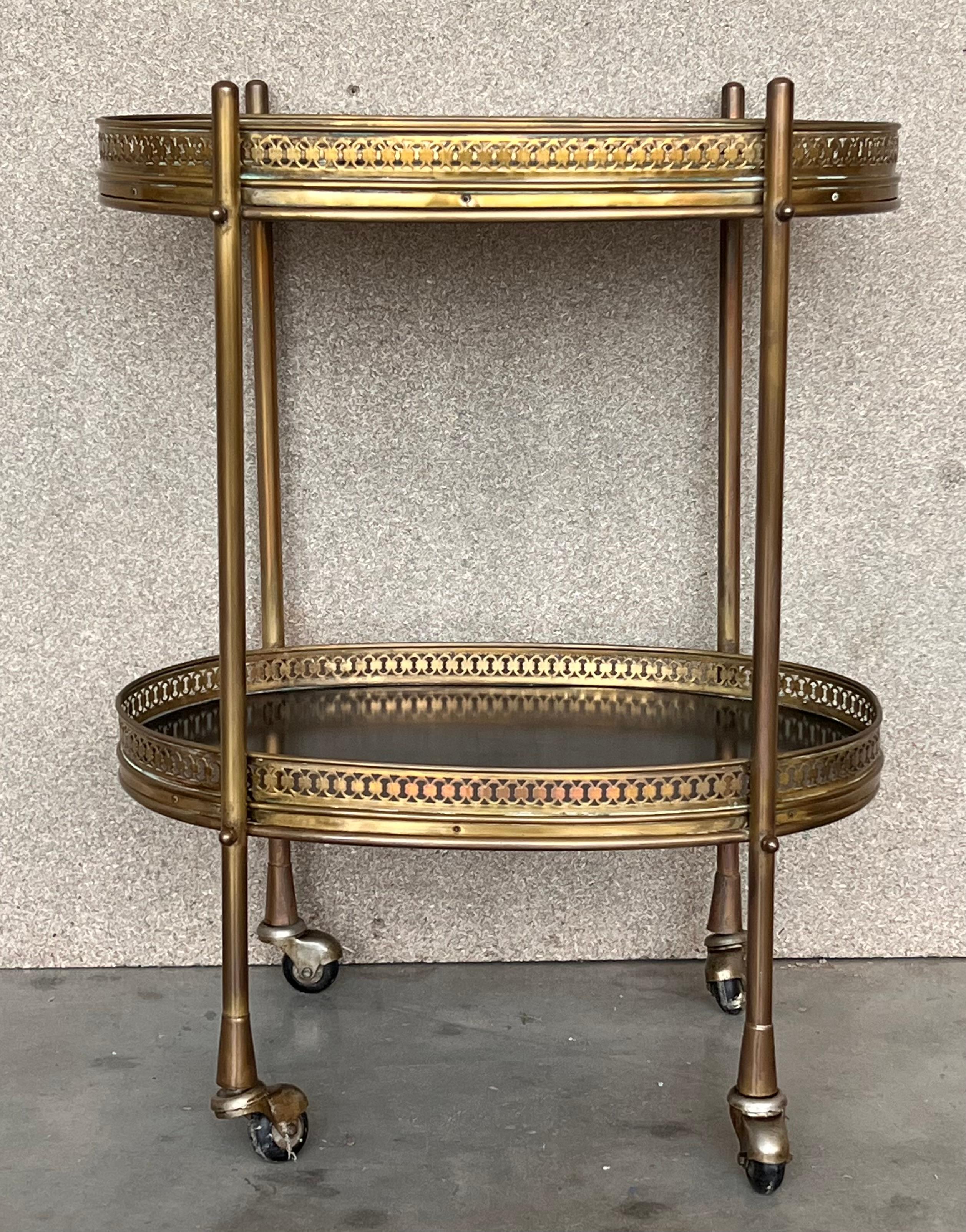 Beautiful Baroque Revival table with removable tray from France, early 19th century, circa 1930-1940. Made of walnut veneer this artfully piece shows great designed legs and comes with a nice highlight - two removable trays tabletop in brass. A hand