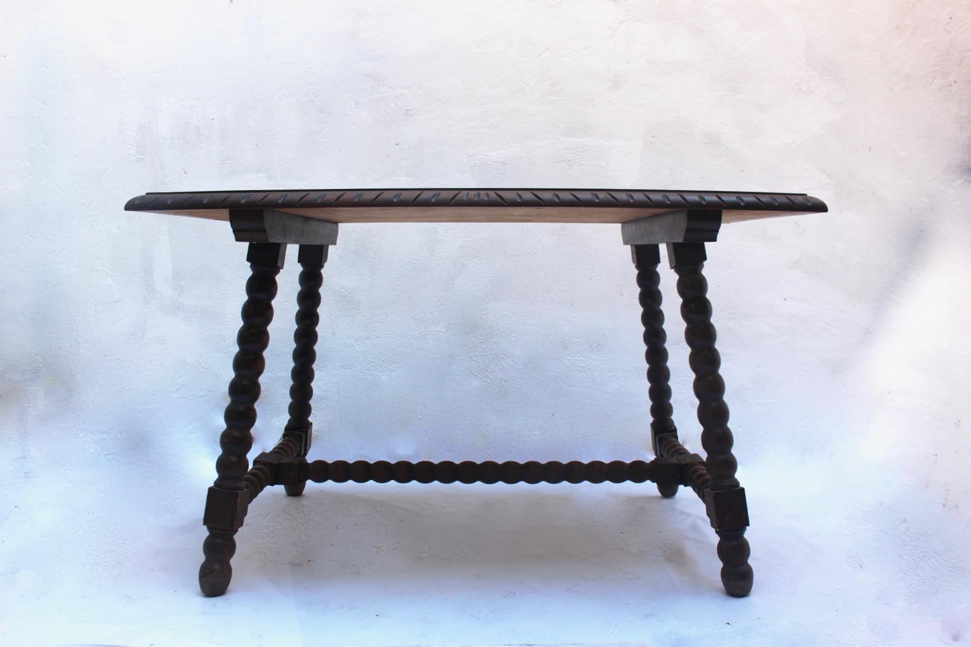 Baroque revival hand carved wood dining table made in Spain, 19th century. Perfect for 6 people, like it is appreciable at the pictures.