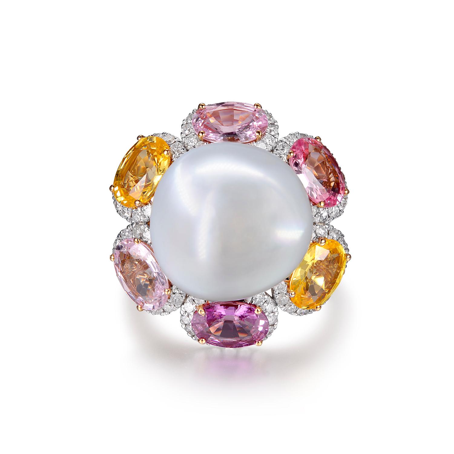 This pearl ring features a 14mm baroque south sea pearl at approximately with 6.50 carat multi color sapphire halo assented with 0.50 carat white round brilliance diamond. A simple yet timeless piece that would compliment any style ! 
Size