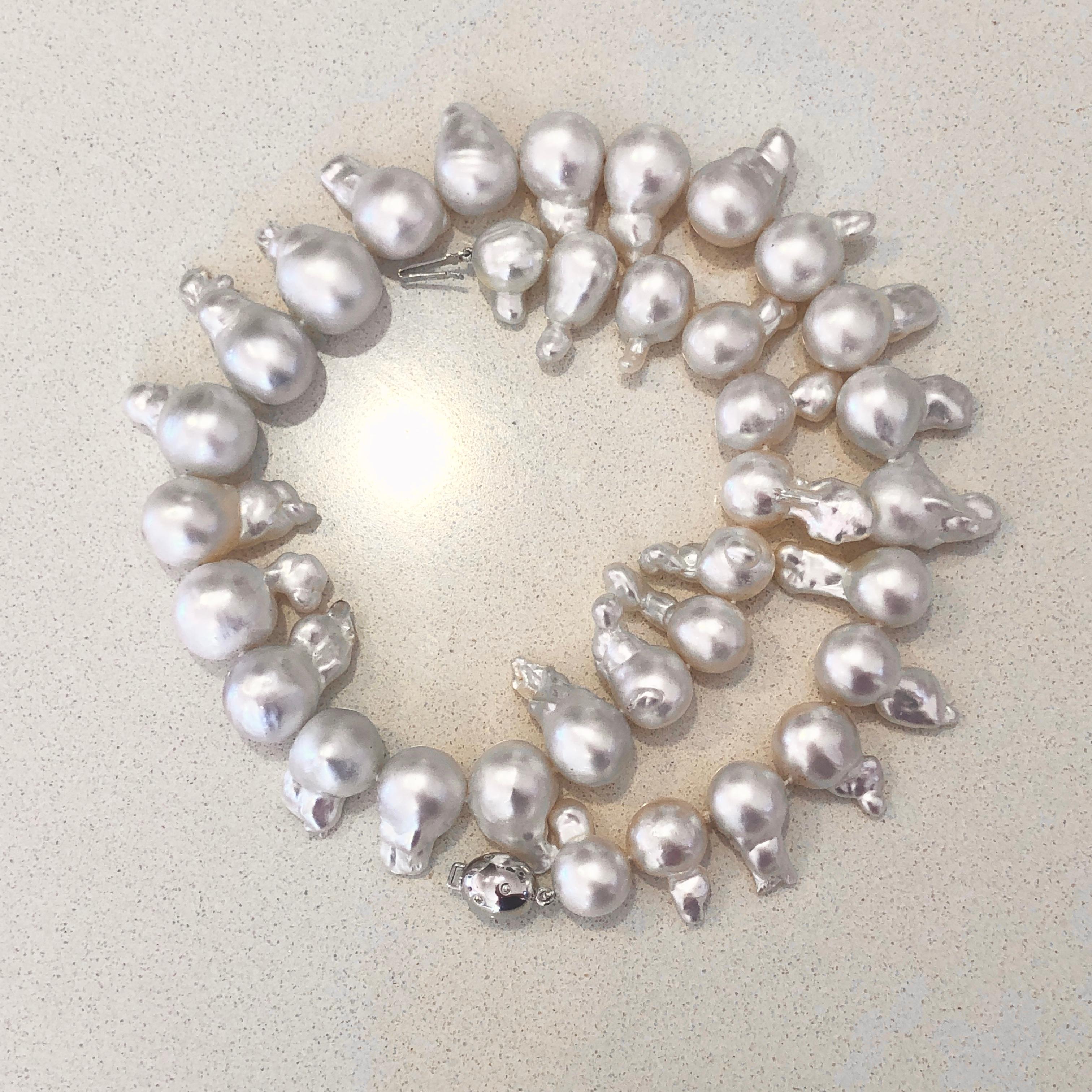 What makes some jewellery so magnificent is their unique beauty - just like this 46 CM Baroque South Sea Pearl Diamond 18 Carat White Gold Necklace.

It is a true wow piece and features 34 striking Baroque pearls full of personality and lustre.