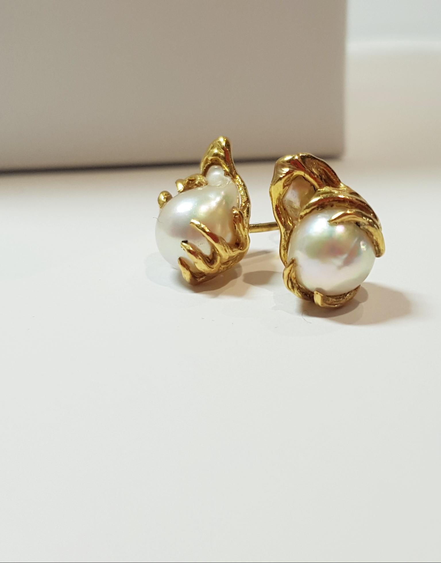 Handmade 18ct yellow gold baroque South sea pearl (7.2 x 10.1mm) stud earrings . 
At Euphoria Jewels ; we love to design and create unique one of a kind pieces ; delicate inspired by nature.
Every Euphoria Jewels item will arrive with a Certificate