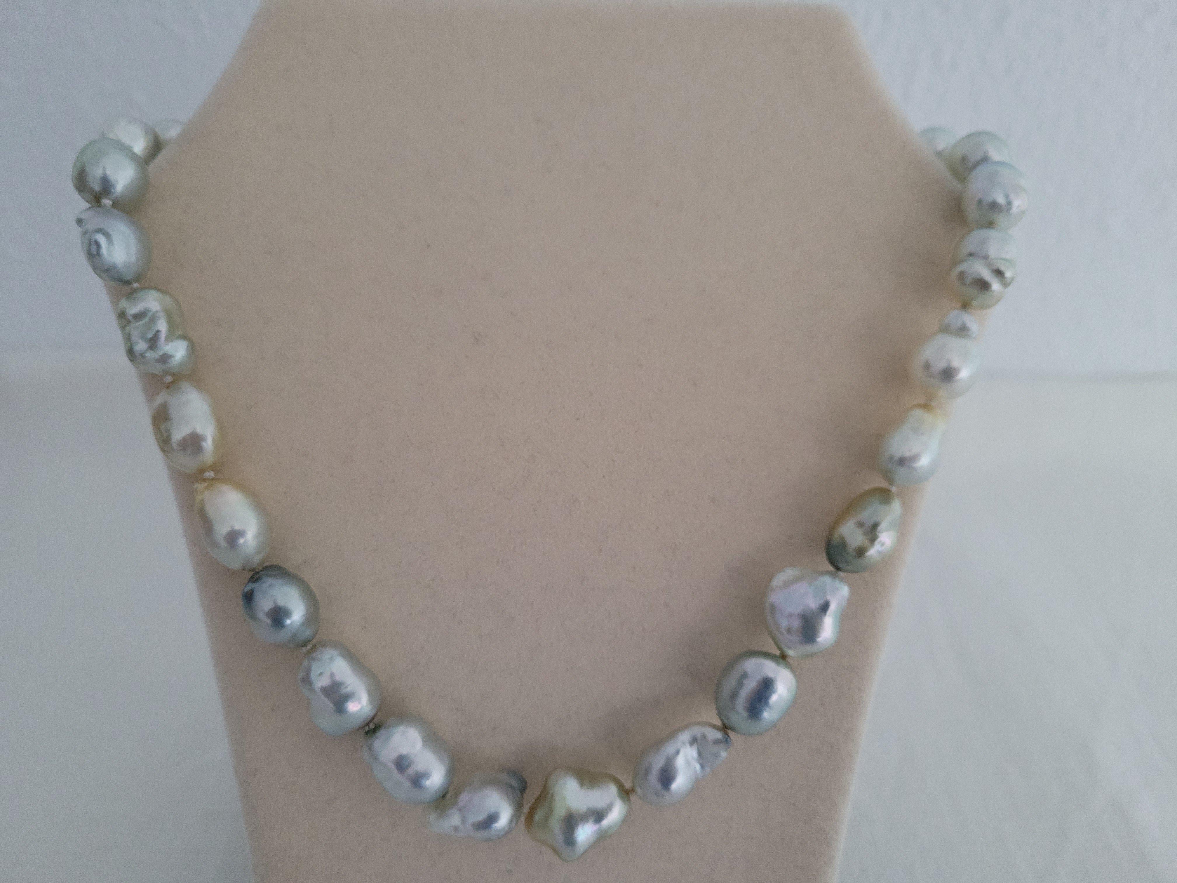 A Natural Color South Sea Pearls necklace of high quality.

- Size of Pearls 9-13 mm of diameter,

- Pearls from Pinctada Maxima Oyster

- Natural Color pearls

- Very High Natural luster and orient

- Pearls of Baroque shape.

- The skin of pearls