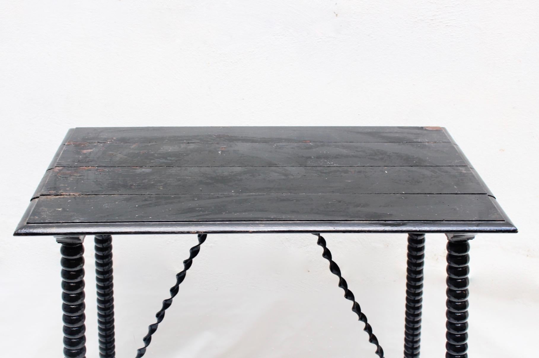 Hand-Carved Baroque Spanish Table with Turned Legs and Iron Stretches, 19th Century For Sale