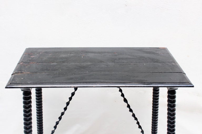 Hand-Carved Baroque Spanish Table with Turned Legs and Iron Stretches, 19th Century For Sale