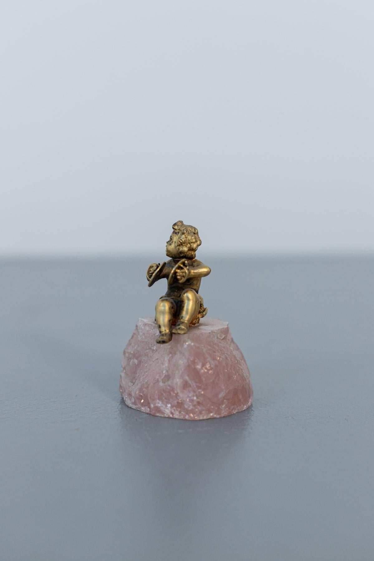 Italian Baroque Statue of Silver Cherub on Rose Quartz For Sale