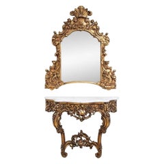 Miroir et console en bois sculpté et doré de style baroque du 19e siècle