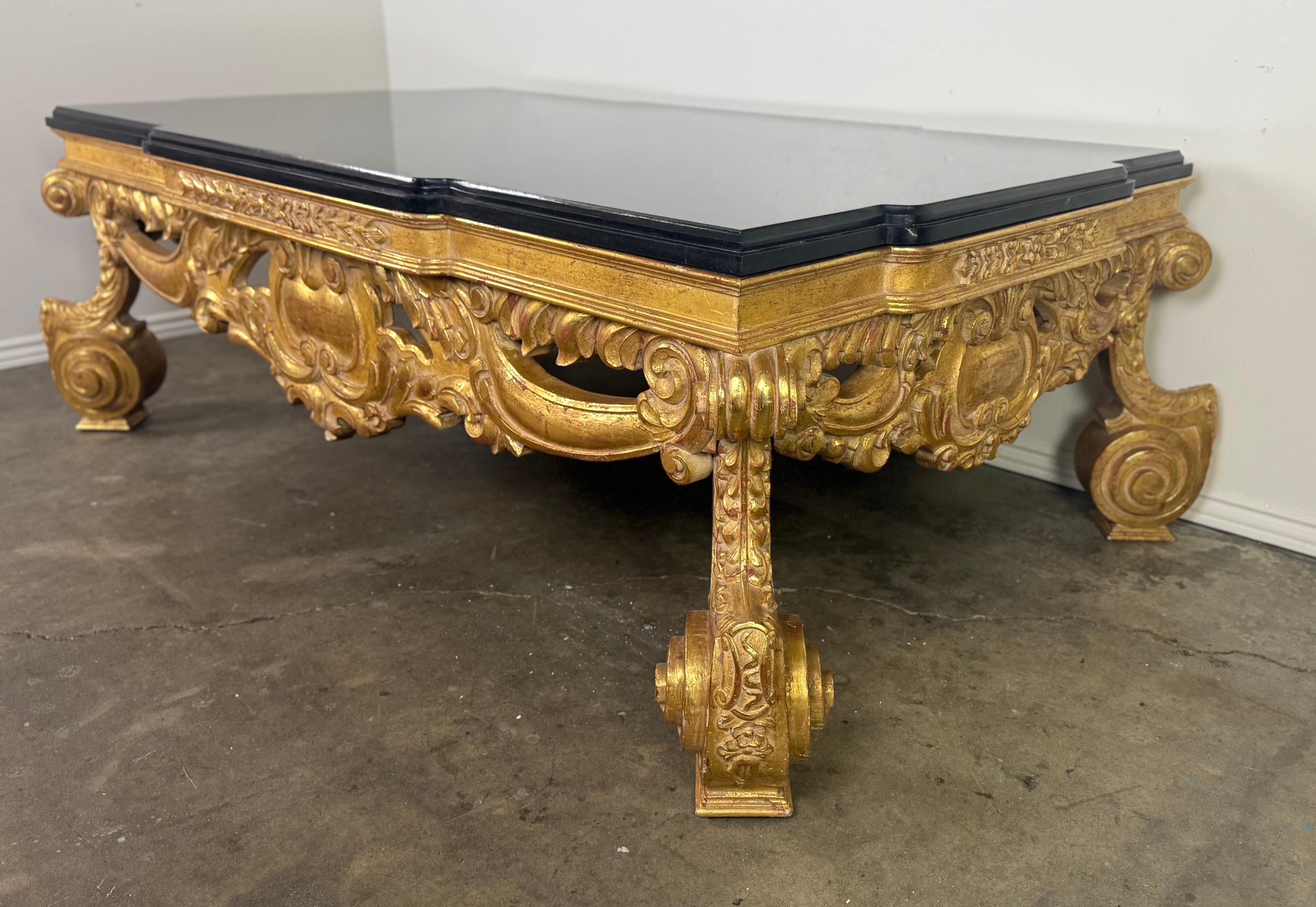 Pierre Baroque-Style 22K Gold Leaf Carved Coffee Table with Black Stone Top en vente
