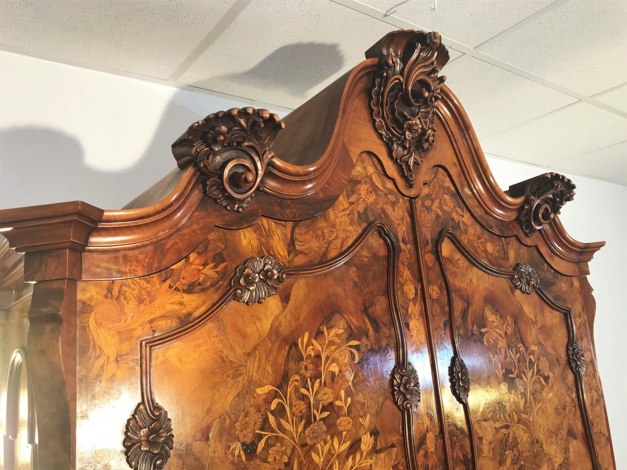 German Baroque Style Armoire with Floral Ornamentations For Sale