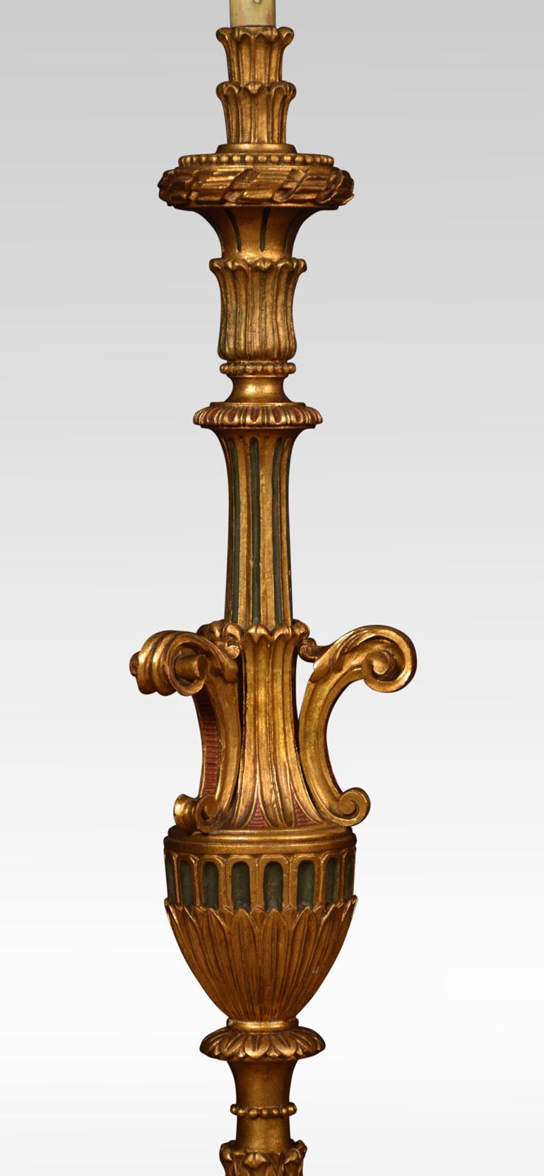 Italian giltwood carved floor lamp in the Baroque manner. The baluster shaped standard is supported on a conical base with sectional carved elements.
Dimensions:
Height 55.5 inches
Width 12 inches
Depth 12 inches.