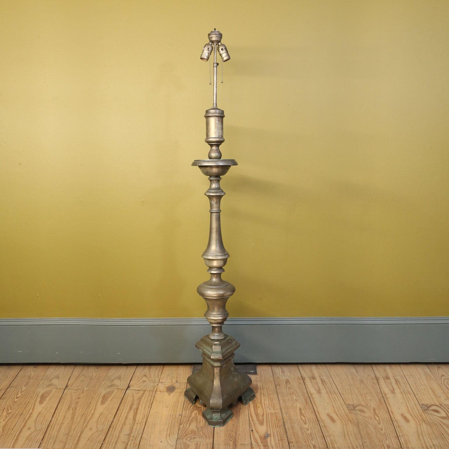 Baroque style Belgian floor lamp, (circa 1900-1920) in brass. Beautiful rich patina. Newly wired for use within the USA using all UL approved parts. Accommodates two medium-size (Edison) bulbs. Sold without shade. The lamps is heavy and of beautiful