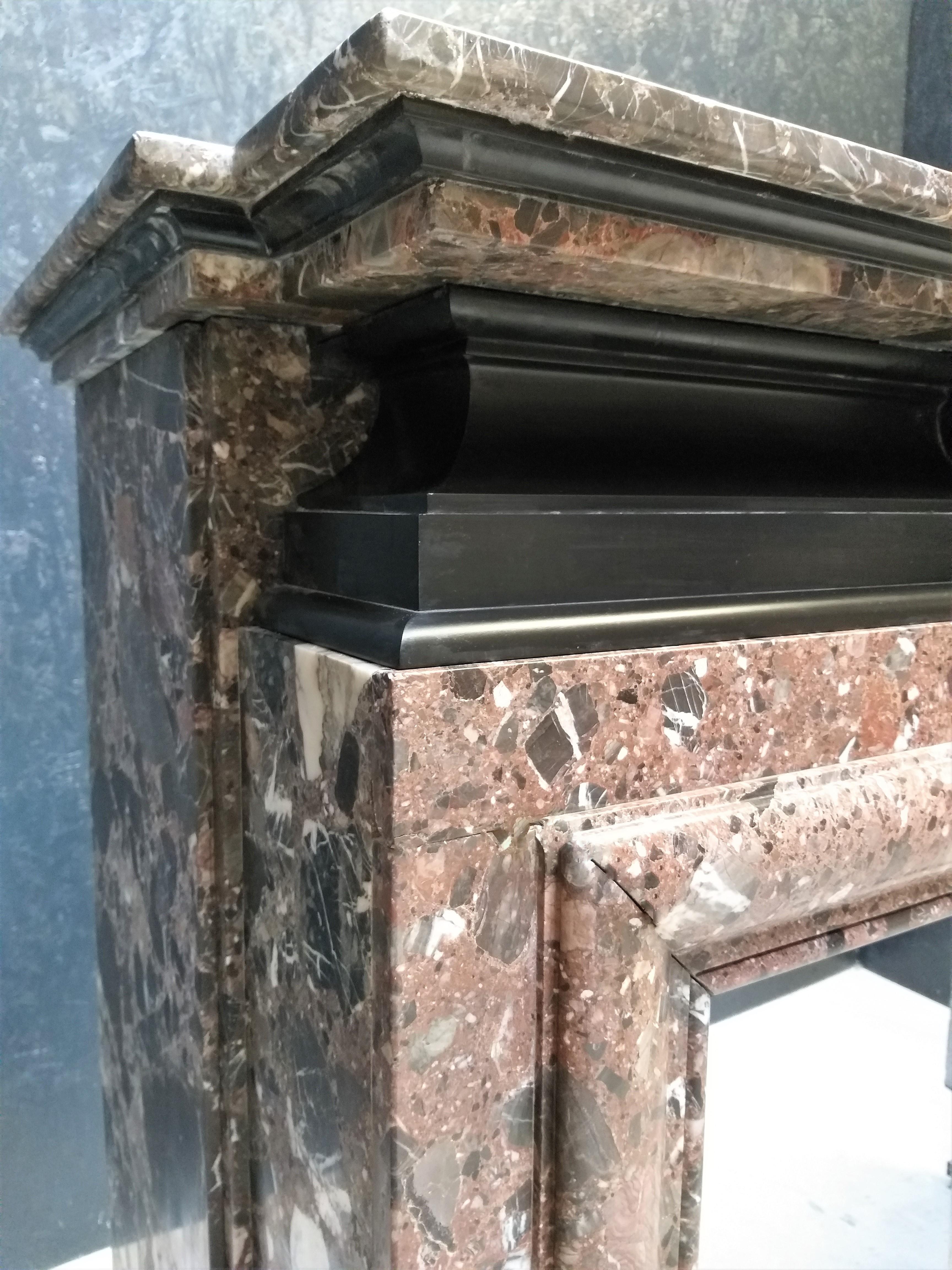 Belgian Baroque style Bolection Fireplace For Sale