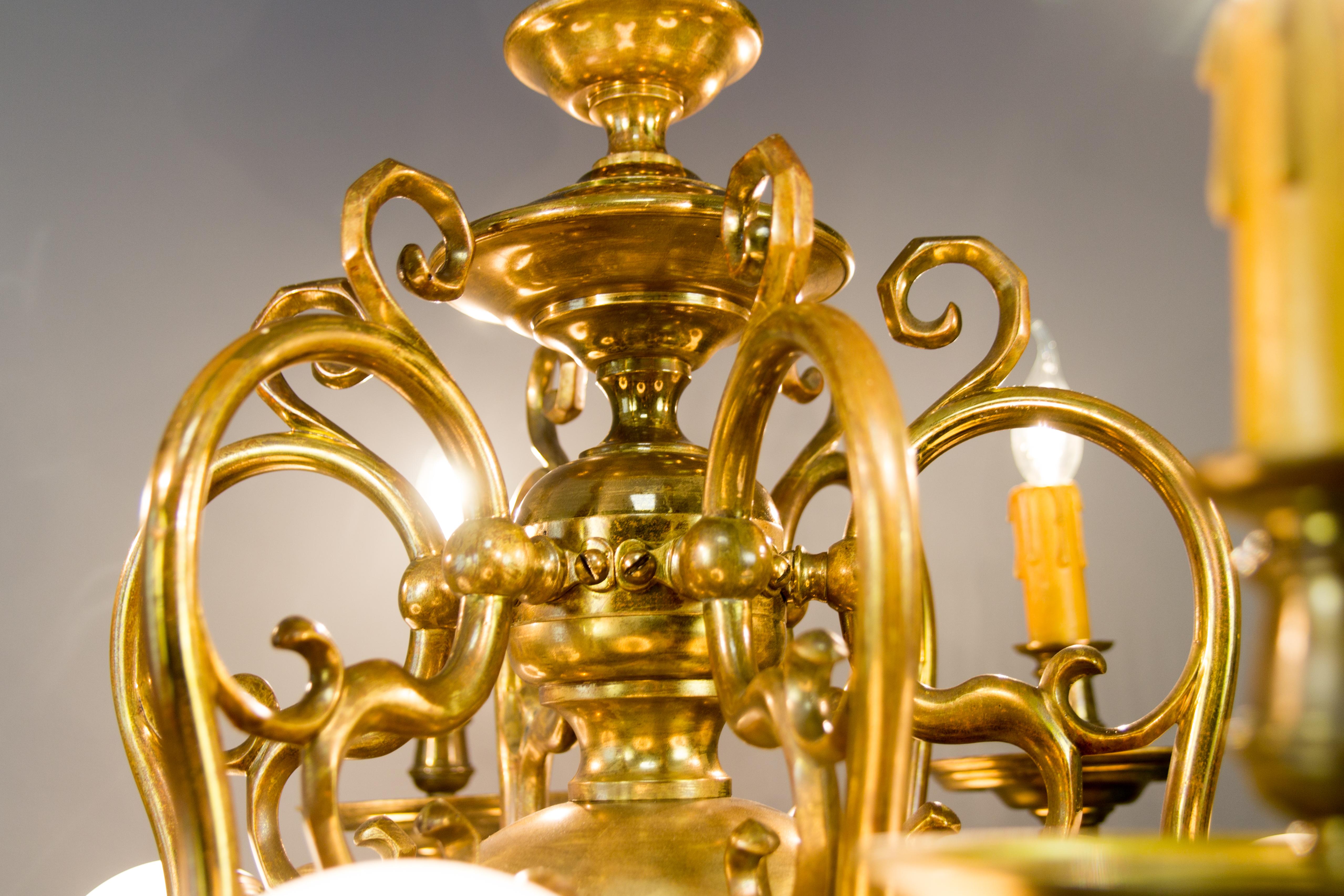 Zwölf-Licht-Kronleuchter im Barockstil aus Messing und Bronze mit Löwenkopf 7