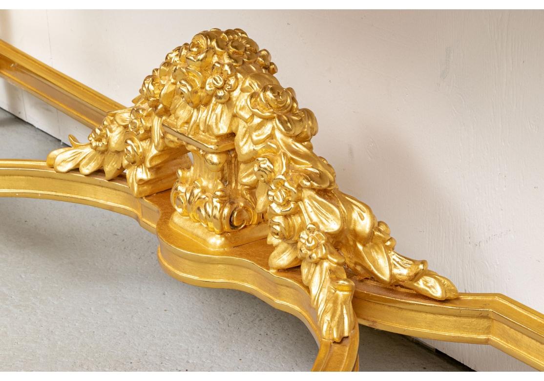 20th Century Baroque Style Carved And Gilt Marble Top Tiered Console Table