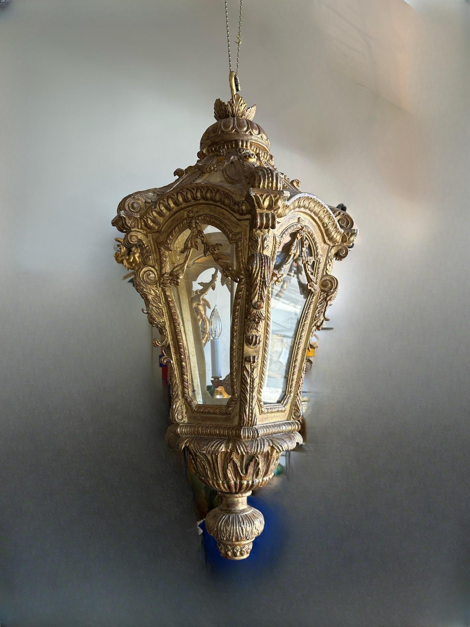 Baroque Style Carved and Gilt Wood Venetian Lantern.  Wonderful delicate carved decoration with original gilded finish and dramatic proportions. Recently rewired. Made in Venice  circa 1860