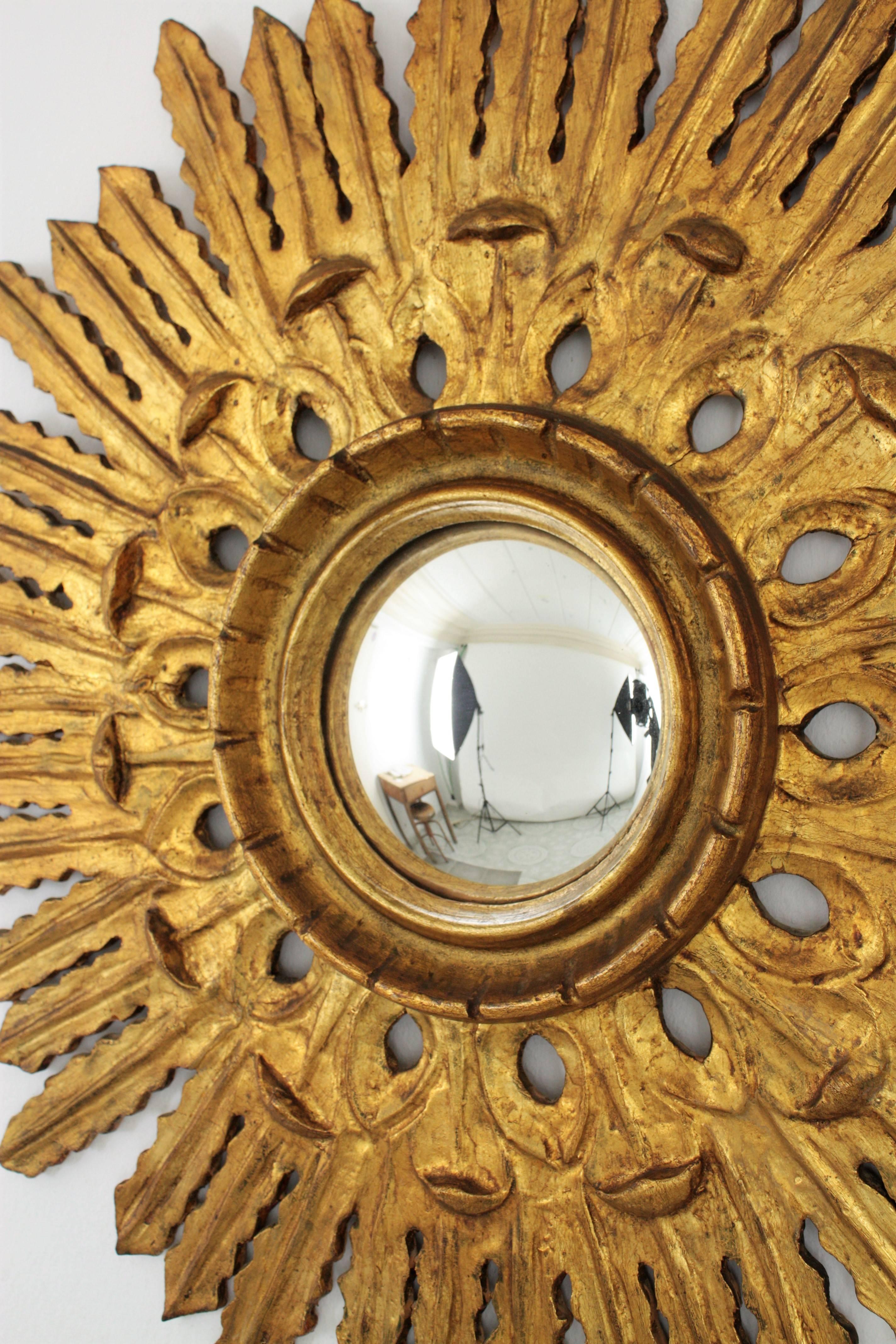 Early 20th Century Baroque Style Carved Giltwood Sunburst Convex Mirror, Spain, 1920s