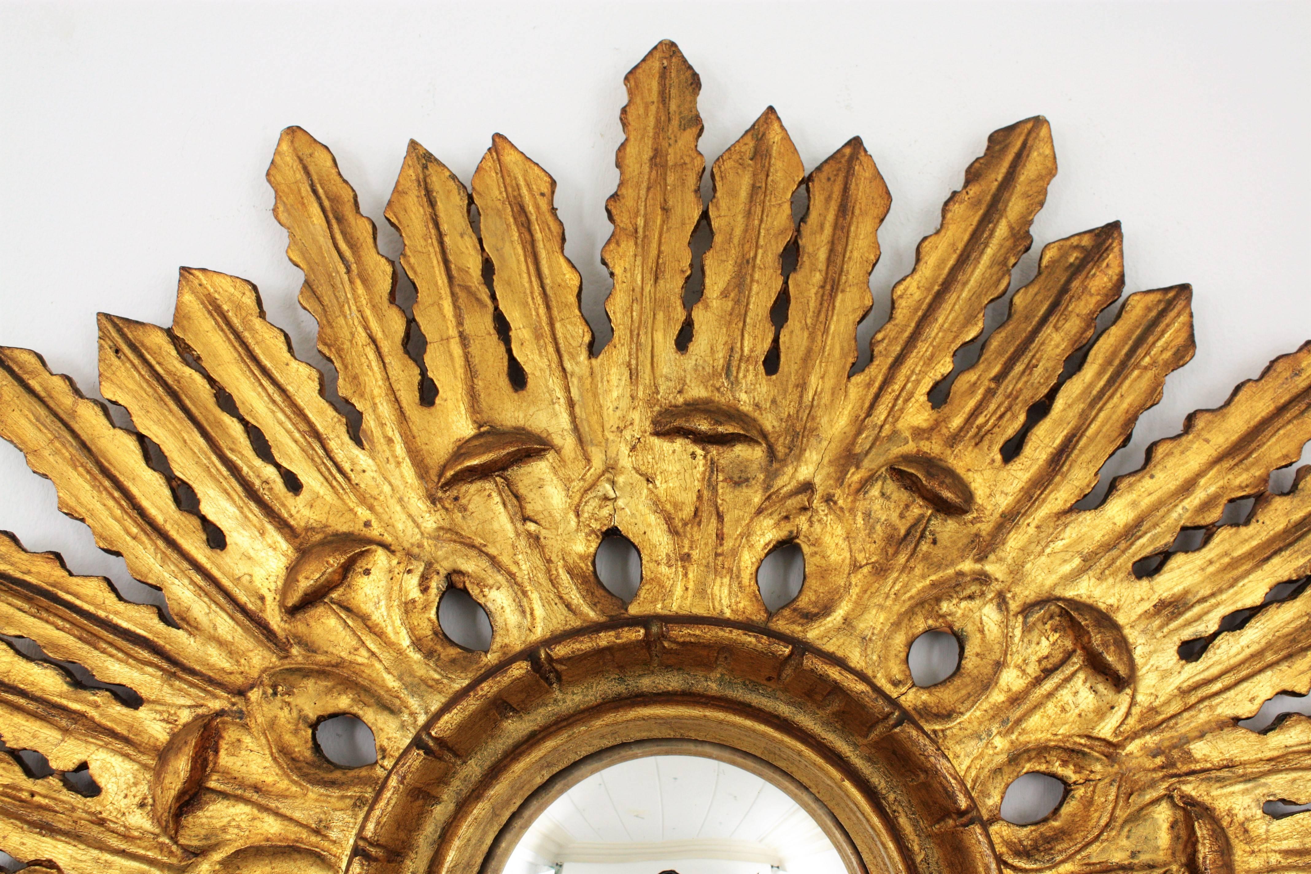 Baroque Style Carved Giltwood Sunburst Convex Mirror, Spain, 1920s 1