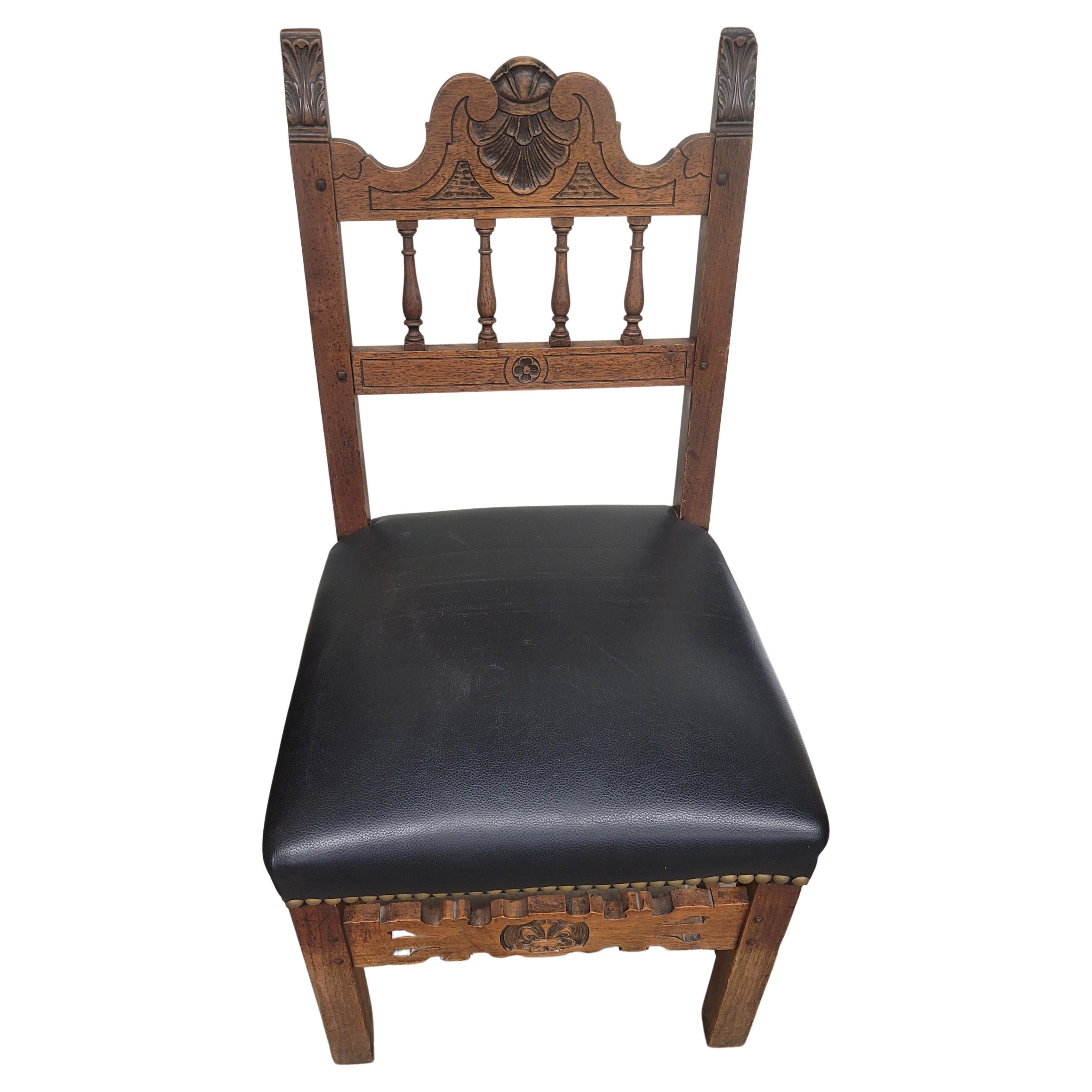 A Baroque style carved wood and leather seat side chair with nail head trims. Newer upholstery in great condition.
Good condition. Measures20