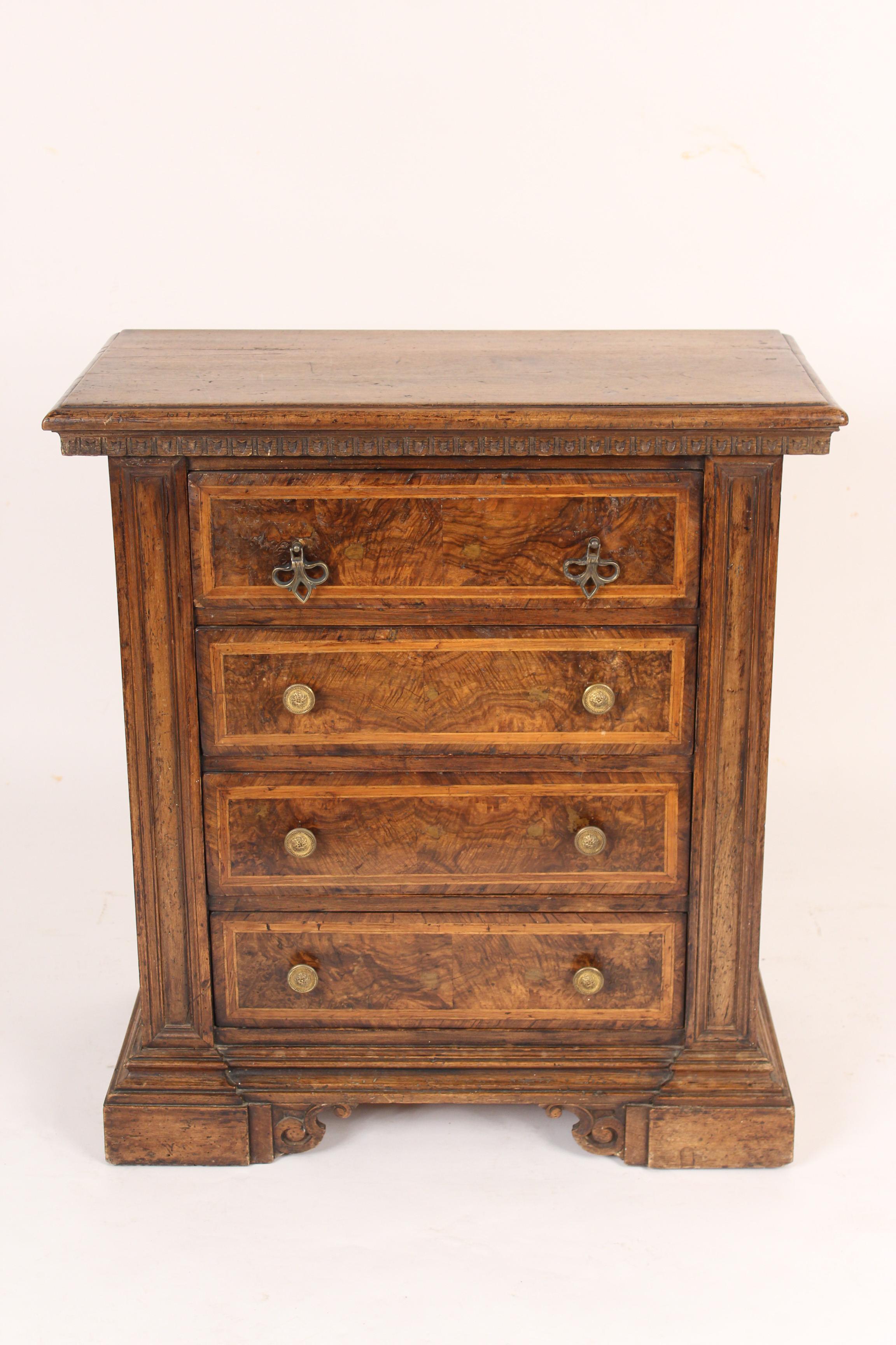 Baroque style walnut and burl walnut or burl olive chest of drawers, made from antique and later elements, circa 1930s.