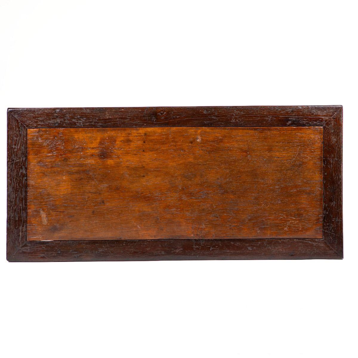 A beautiful dining table from the Philippines, crafted between 1840 and 1860.
The frame is made from dark balayong wood, while the center panel of the tabletop is made from a single piece of lighter molave wood.

The Philippines, a Spanish colony