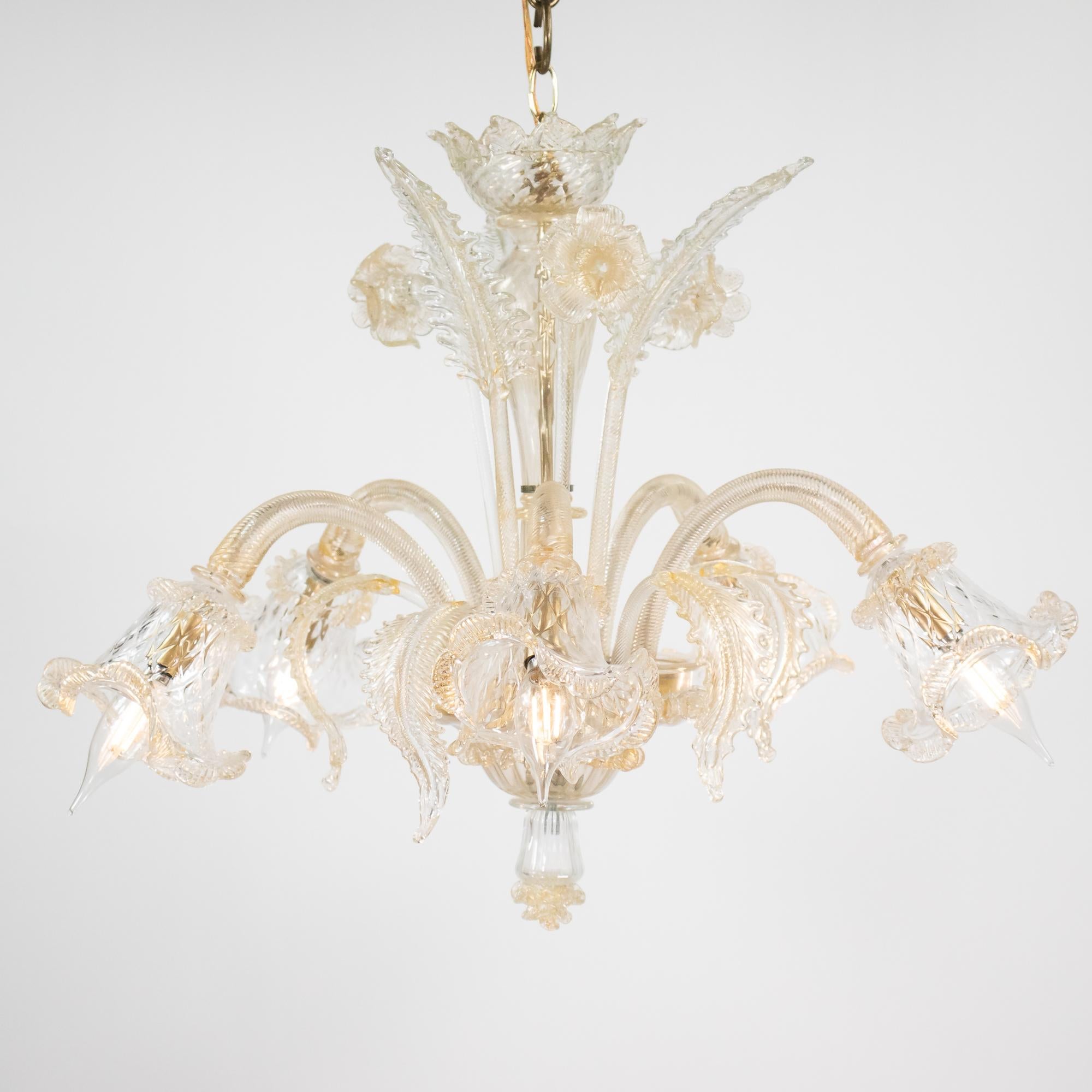 This is a vintage Murano glass chandelier crafted in the style of the ‘Ca'Rezzonico’ chandeliers, first created by Giuseppe Briati in the 18th century. This modern reinterpretation of the ‘Ca'Rezzonico’ style, named after the Venetian palace where
