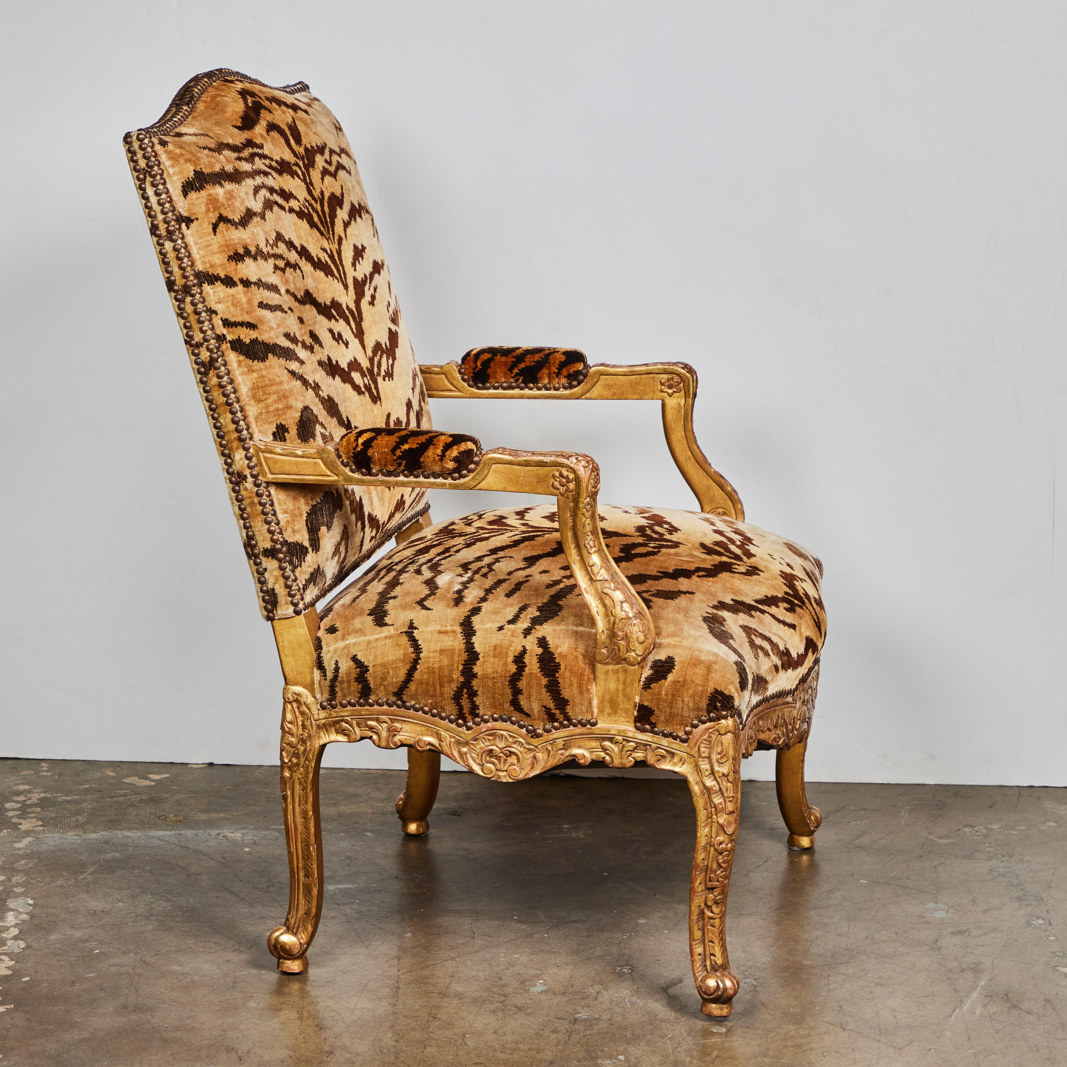 Hand-Carved Baroque Style Gilded French Armchair For Sale